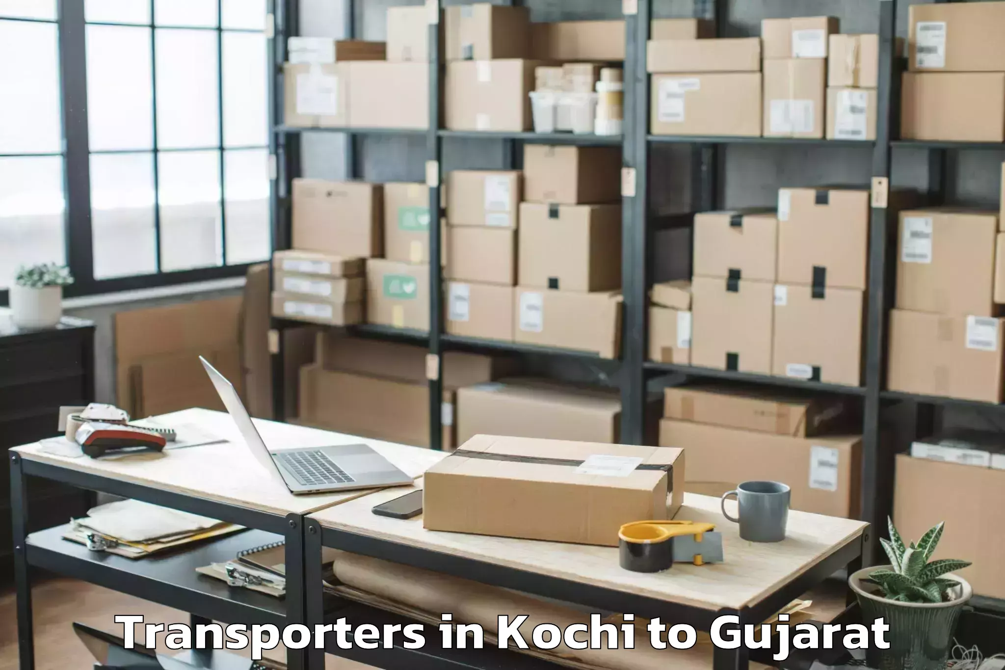 Top Kochi to Porbandar Transporters Available